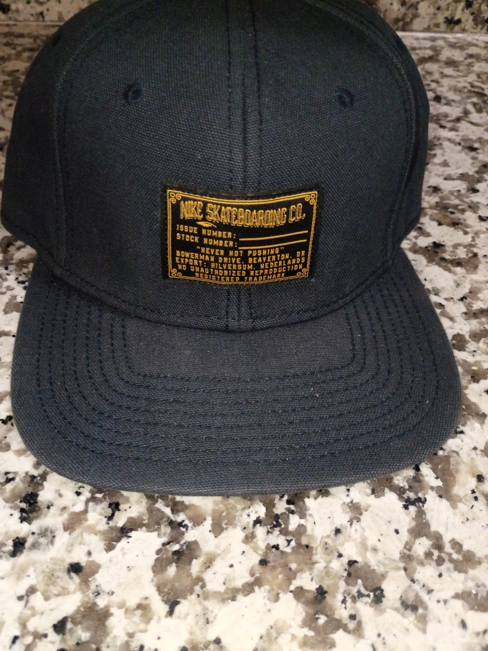 Nike SB Navy Strapback Hat with Gold Stock Patch